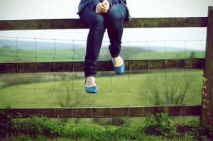 Girl on a fence